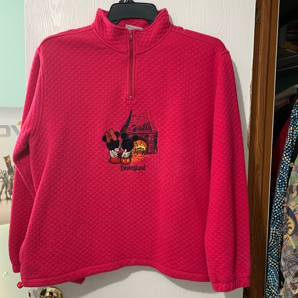 Disneyland Resort Pink quilted pullover with embroidered Mickey & Minnie Mouse.